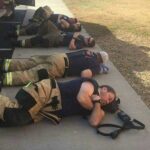 Man captures image of exhausted firefighters after 24 straight hours on duty